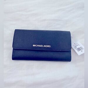 Michael Kors- large navy blue wallet with floral interior. Tri-fold. NWT